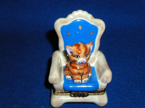 TABBY ON BLUE CHAIR